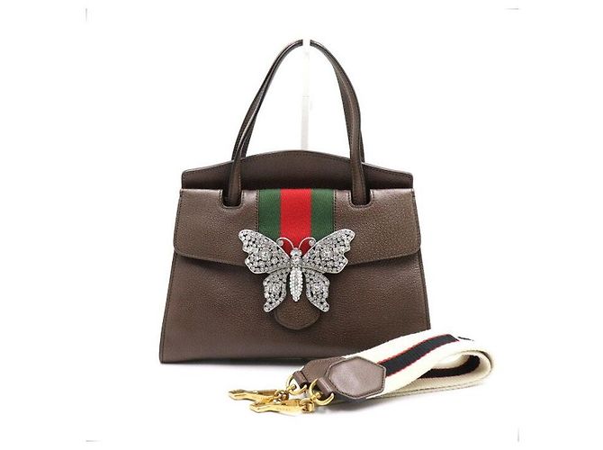 Gucci Bolsa Tote e Bolsa de Ombro Transversal em Couro Marrom com Borboleta de Cristal e Alça de Mão