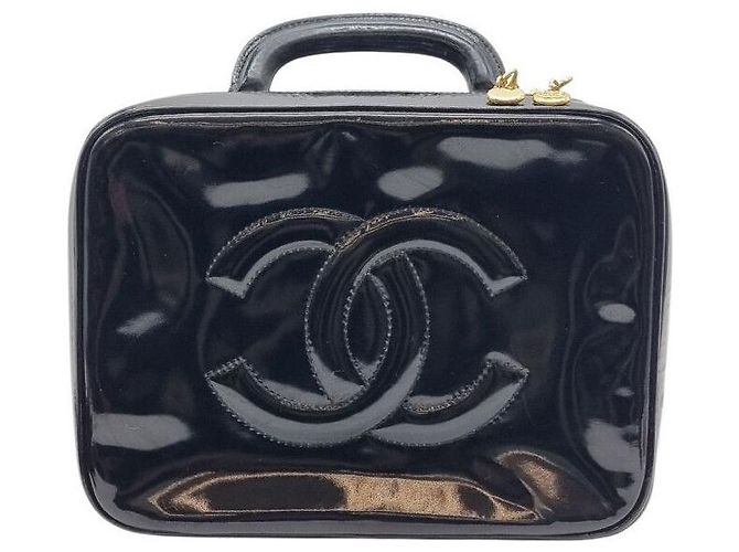 Chanel Bolso de mano con asa superior y bandolera en charol Negro