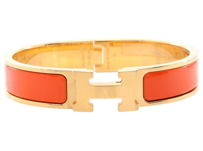 Pulsera Hermès Clic Clac PM Dorado Naranja