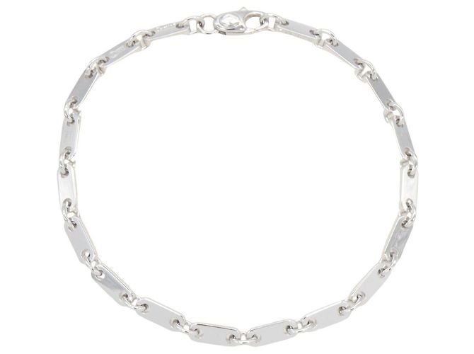 Pulsera de charms Figaro de Cartier en oro blanco de 18K