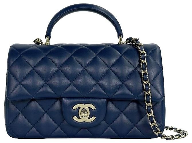 Chanel Bolsa de aba com alça de mão Classic New Mini Navy Azul
