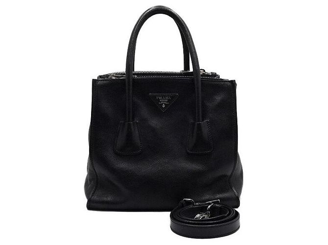 Prada Tote e bolsa de ombro em couro de vitelo vitrificado preto