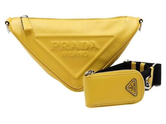 Prada Bolso de hombro y bolso bandolera en cuero amarillo con logotipo triangular
