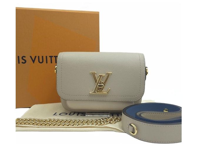 Louis Vuitton Bolsa de ombro e transversal em couro de vitelo granulado macio Marrom