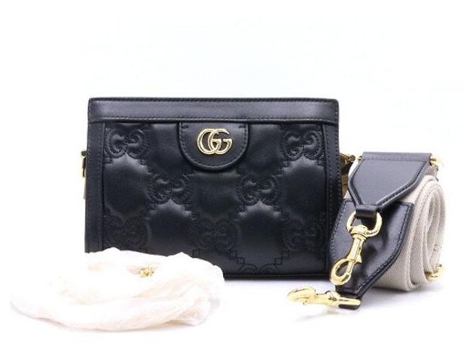 Gucci Mini bolsa de ombro e transversal em matelassé com relevo GG preto e corrente dourada