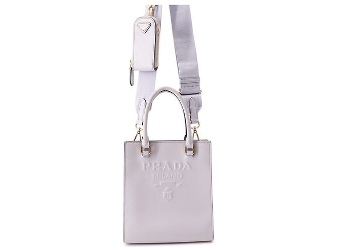Bolsa de mão Prada Mini Triangle em couro Roxo