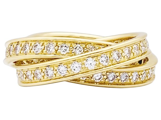Anillo Cartier, "Trinity", oro amarillo, diamantes.