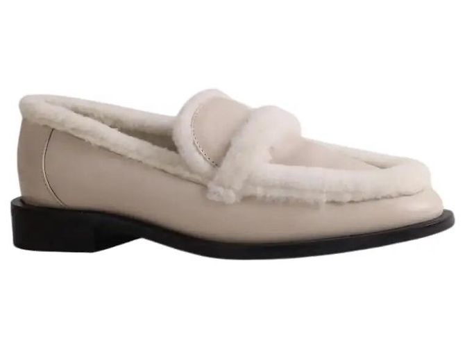 Mocasines Stuart Weitzman de piel ecru Crudo