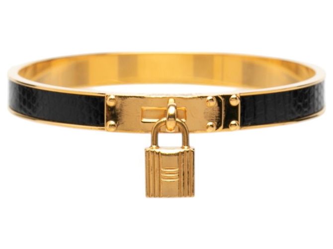 Bracciale Hermès Kelly in pelle nero e oro D'oro