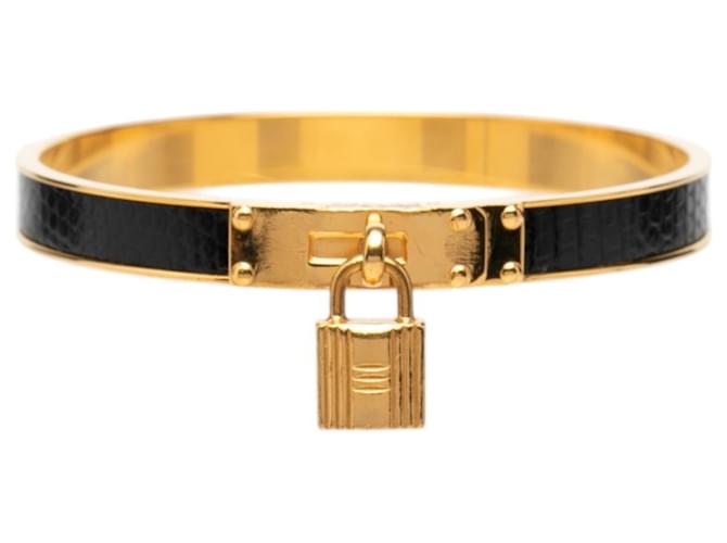 Bracelete Hermès Kelly de couro preto e dourado 