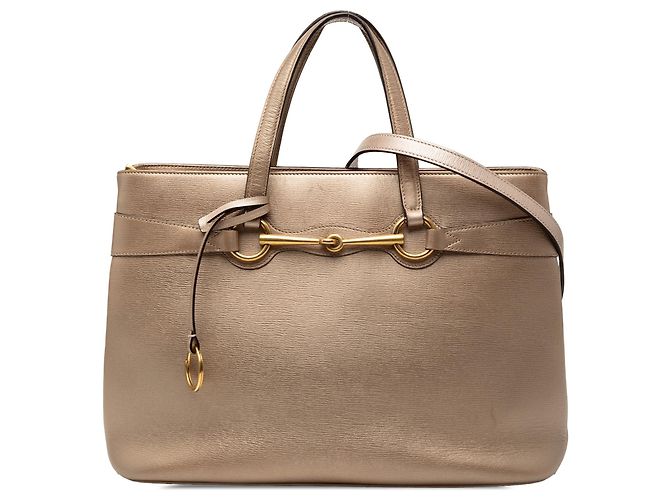 Bolsa Gucci de couro Bright Bit dourada Dourado