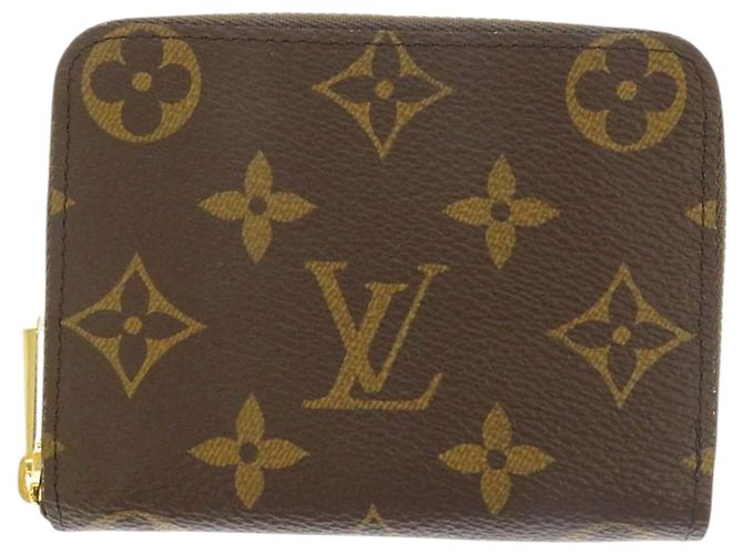 Portamonete Louis Vuitton Monogram Zippy marrone