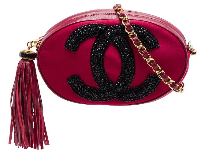 Bolsa transversal oval de camurça vermelha com emblema CC e borla Chanel Vermelho