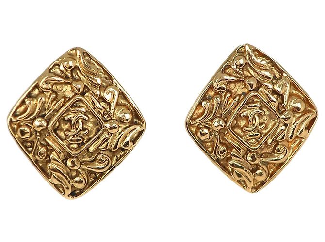 Orecchini a clip Chanel CC placcati in oro e diamanti D'oro