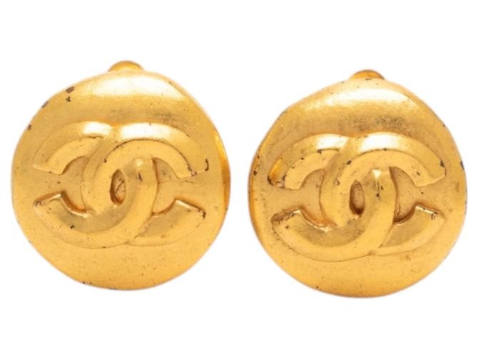 Orecchini a clip rotondi Chanel CC placcati oro D'oro