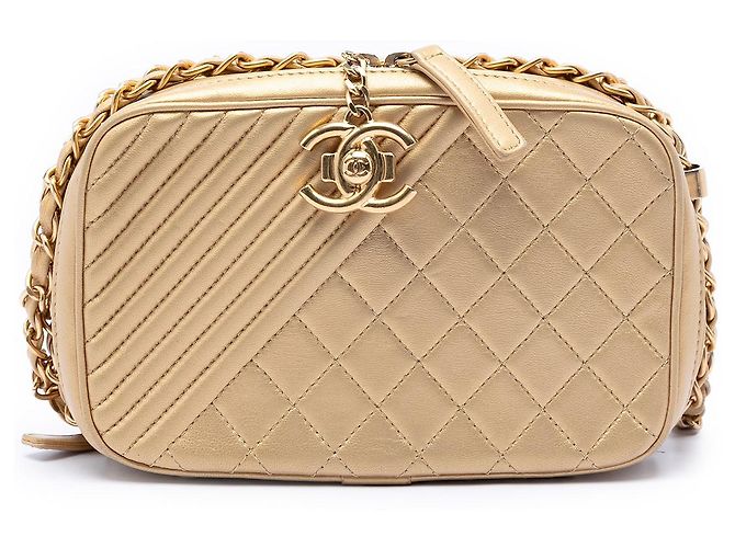 Sac bandoulière Chanel Small Quilted Lambskin Coco Boy en cuir agneau doré