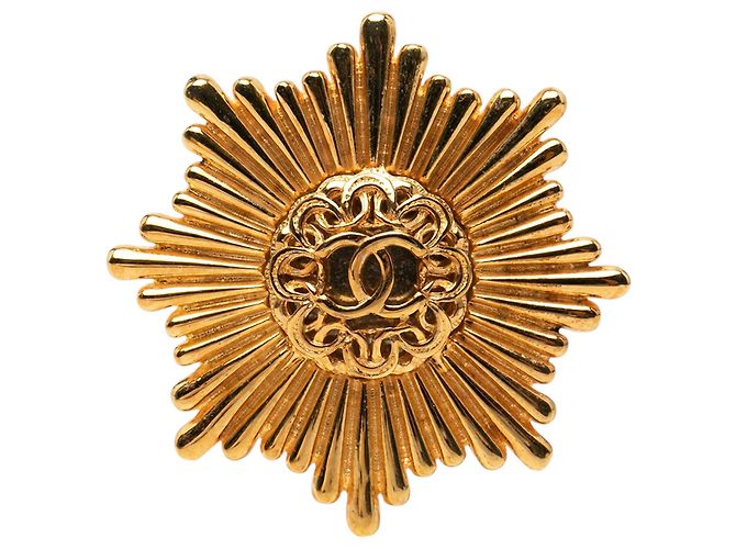 Spilla Chanel CC placcata oro Starburst D'oro