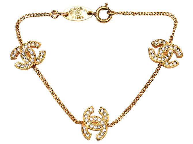 Bracciale Chanel Triple CC placcato oro e strass D'oro