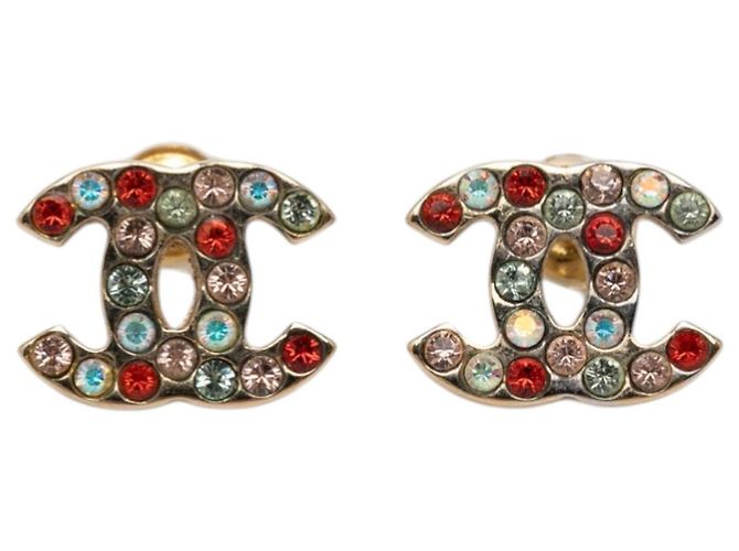 Orecchini Chanel CC placcati oro con strass e chiusura a farfalla D'oro