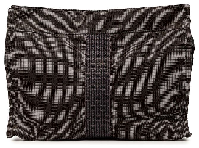 Clutch Herline Hermès de lona gris