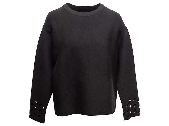 Alaïa Schwarzer Alaia Wollpullover mit Cutout-Details an den Manschetten Größe IT 40