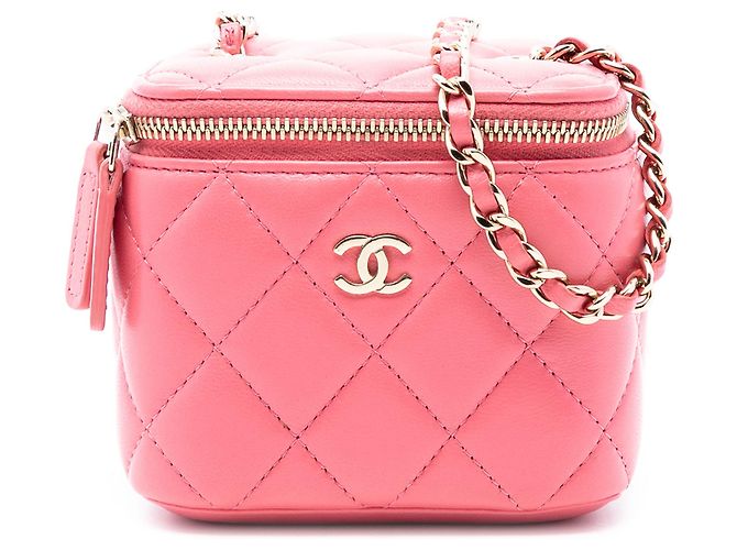 Mini Maleta Vanity Chanel em pele de cordeiro acolchoada rosa com alça de mão e corrente transversal
