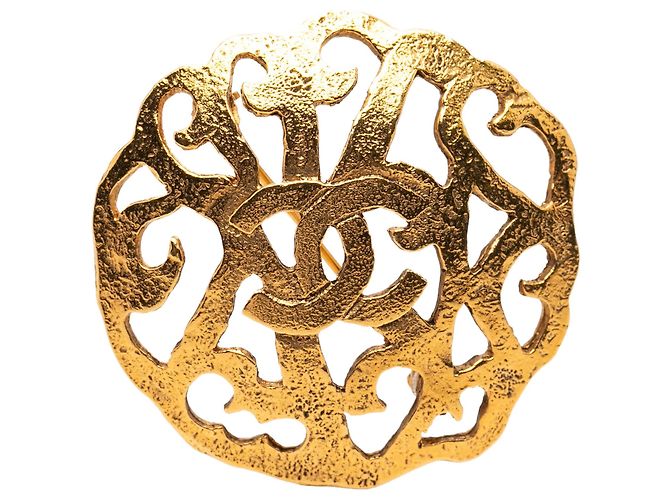 Spilla Chanel CC placcata oro D'oro