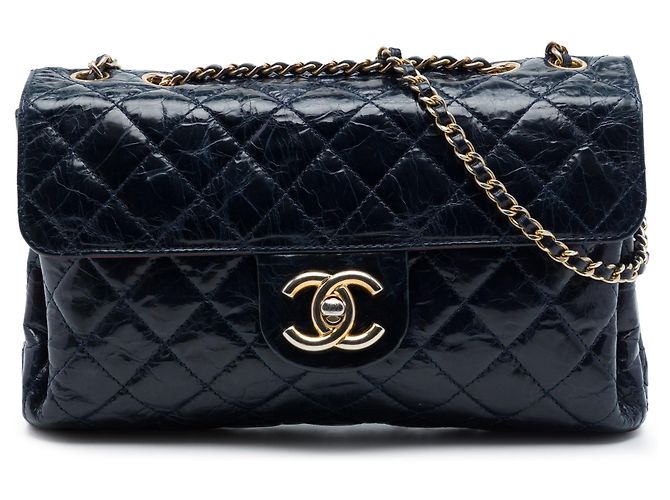 Bolsa de ombro Chanel CC acolchoada em couro de vitelo craquelado azul