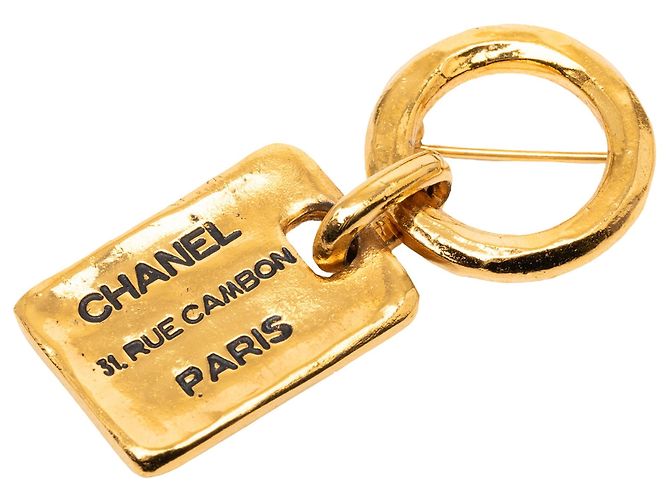 Spilla Rue Cambon Chanel CC placcata oro D'oro