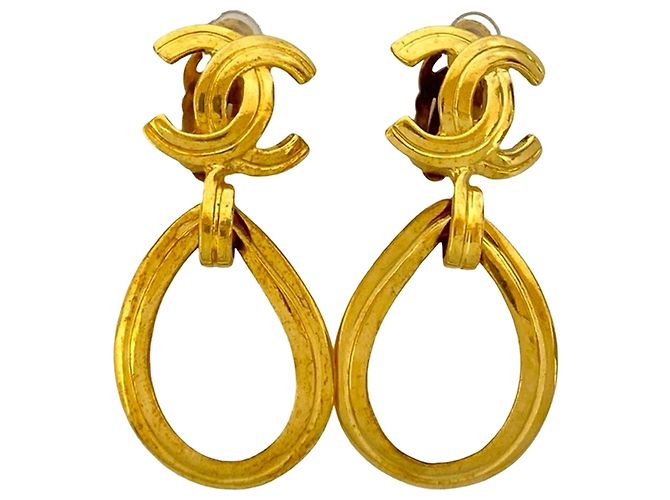 Orecchini a cerchio con clip Chanel CC placcati oro D'oro