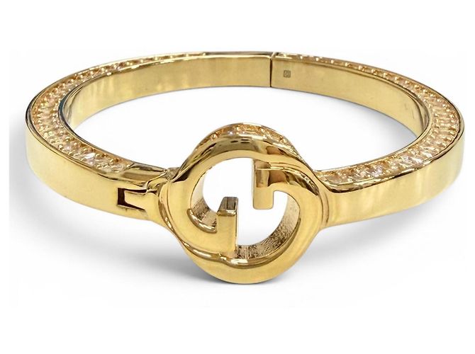 Bracciale rigido GUCCI Blondie con G interlocking e strass D'oro