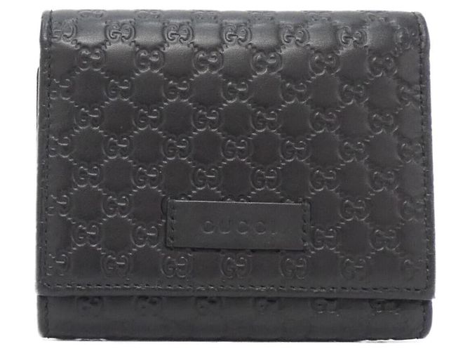Cartera tríptico Gucci en piel Micro GG negra Negro