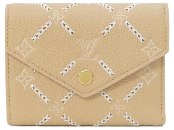 Louis Vuitton Monogram Empreinte Portefeuille Victorine Beige