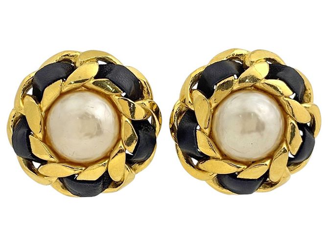 Boucles d'oreilles clips Chanel noires et dorées