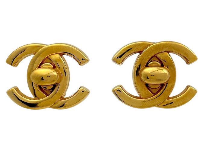 Orecchini a clip Chanel dorati con logo Coco D'oro