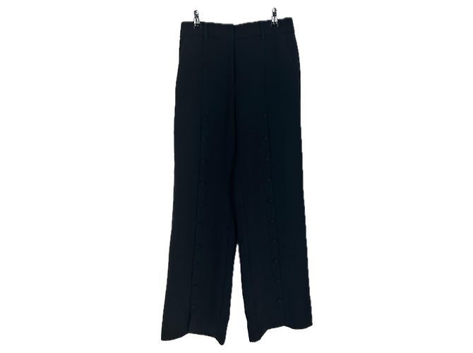 Autre Marque Weite schwarze Hose mit Knöpfen