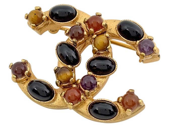 Chanel vergoldete Brosche mit Farbedelstein
