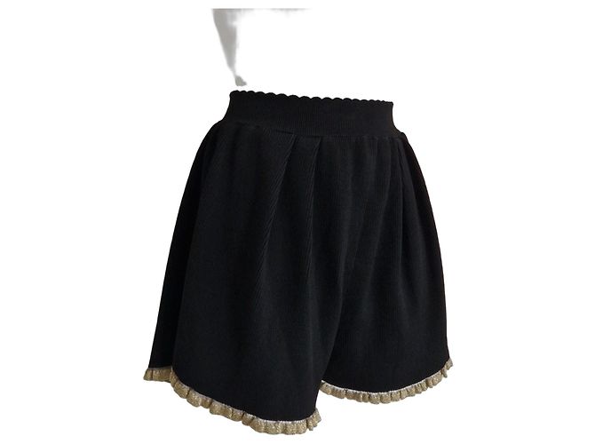 Paco Rabanne schwarze Strickshorts mit Goldrand