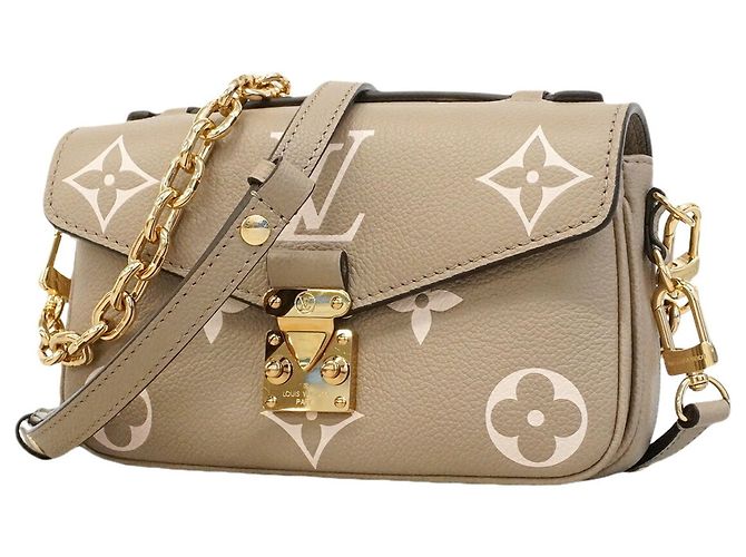Borsa Louis Vuitton Monogram Empreinte Bicolor Pochette Métis EW Crudo