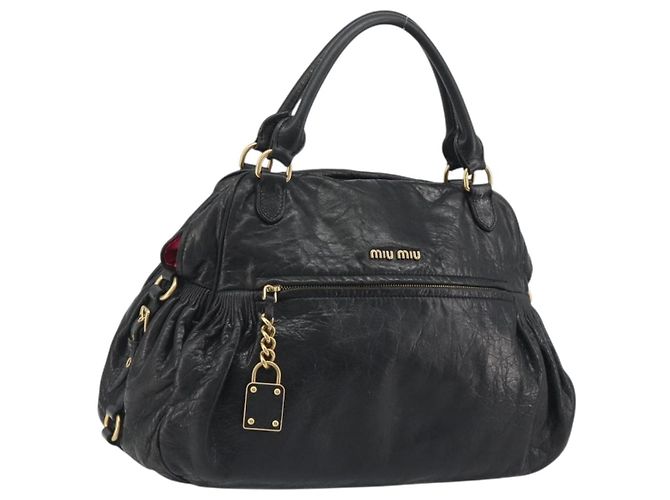 Bolsa de mão Miu Miu em couro preto e dourado Auth bs36659V