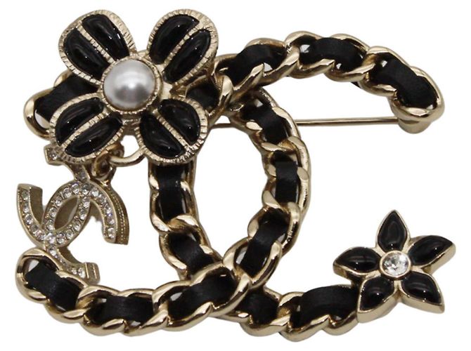 Broche Chanel preta e dourada com strass Preto Dourado