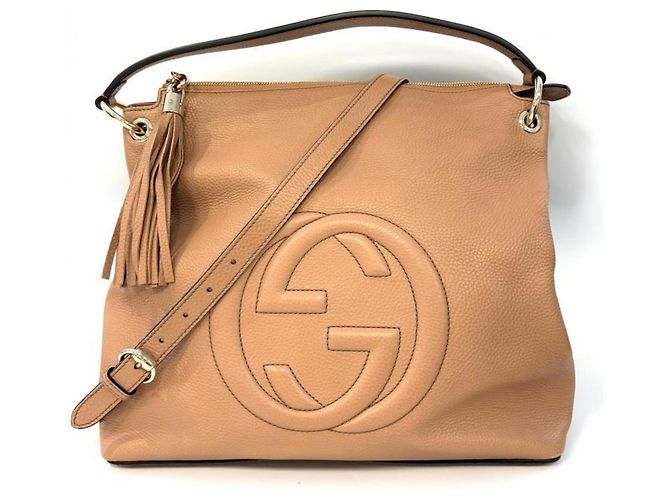 Bolsa de mão Gucci Soho em couro bege