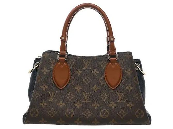 Louis Vuitton A timepiece bag harmonizing a classic Monogram pattern with a luxurious handle. Despite its compact BB size, it has ample interior storage for efficiently keeping daily belongings. Sturdy canvas Brown