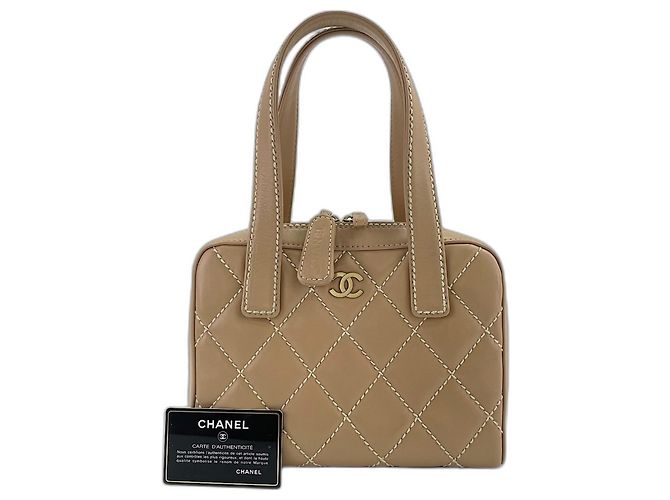 Bolsa Chanel Bege