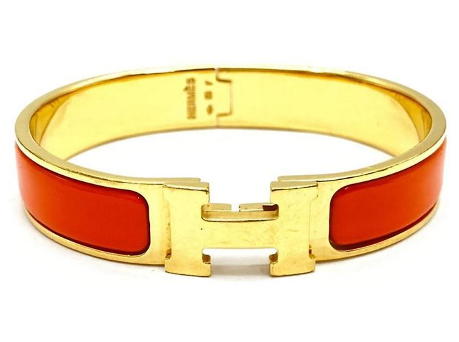 Hermès Brazalete Hermes Clic Clac PM en Orange Naranja