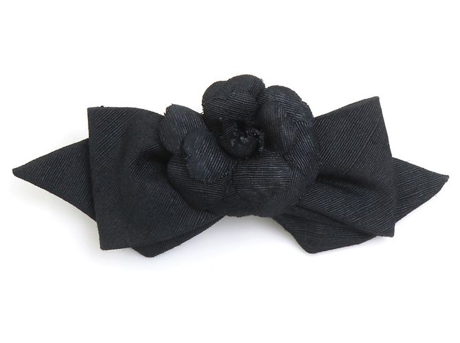 Fermi capelli Chanel in tela nera Nero