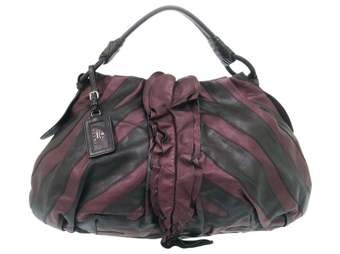 Borsa a mano in pelle Prada VITELLINO MORDO BR3984 Nero Porpora