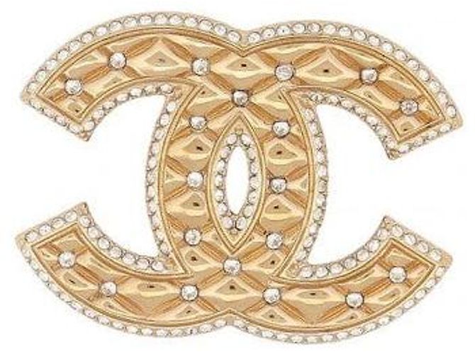 Broche Chanel CC Efecto Acolchado en Metal Dorado con Strass