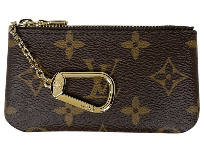Louis Vuitton Pochette Clé Geldbörse/Münzbeutel Braun