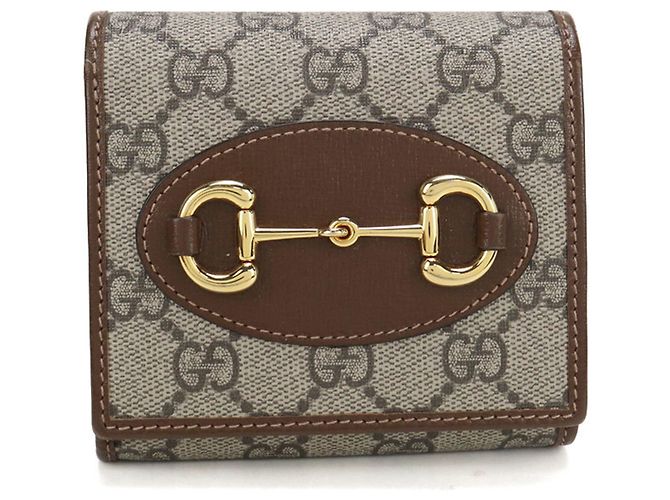 Cartera Gucci Bi-fold GG Supreme Beige